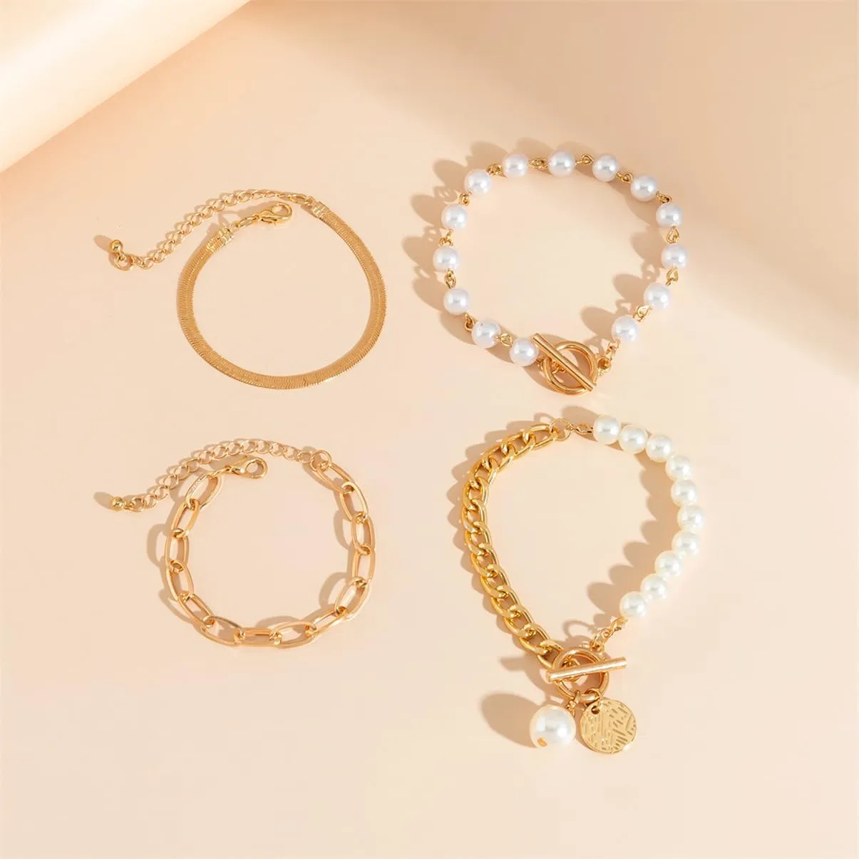 4Pcs Gold Tennis Link Bracelets Set for Women,14K Gold Plated Pearl Bracelets for Women,Dainty Layered CZ Paperclip Snake Cuban Link Chain Bracelets for Women